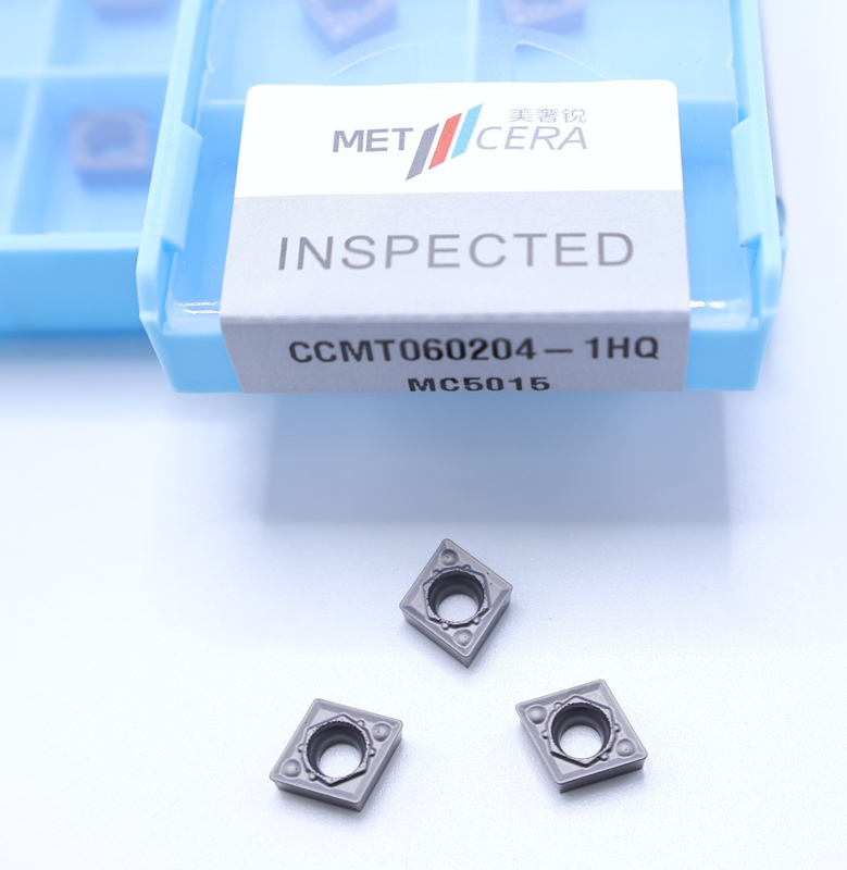 Γλυκιά επιφάνεια MC5015 βαθμός CCMT060204-1HQ Εισάγματα εργαλείων κοπής Cermet με καλή αντοχή σε σπασμούς